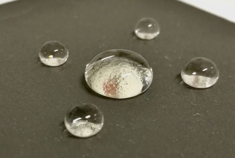 Water drops on a coated ceramic surface